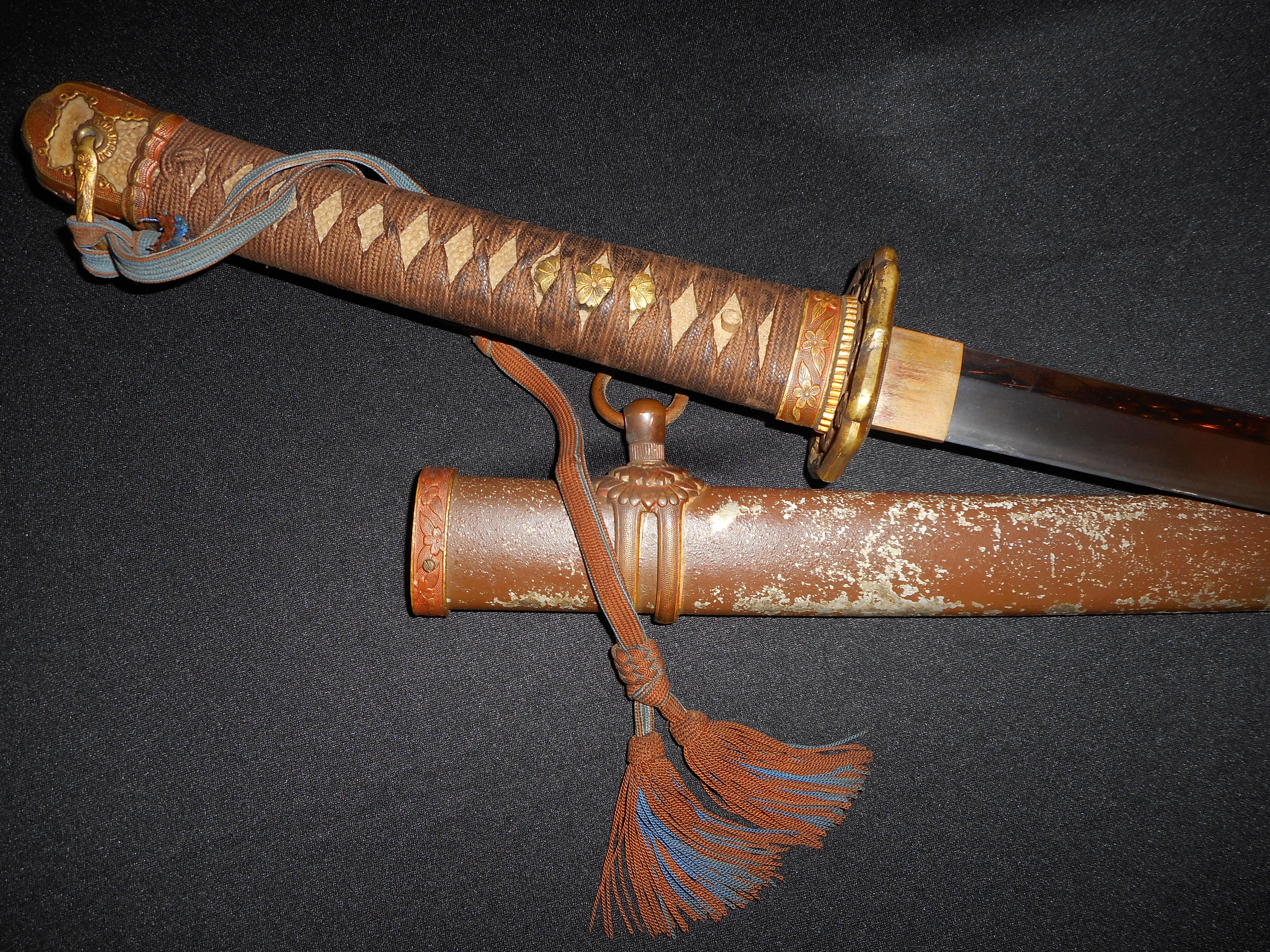 an offer on your Japanese Sword(s). 1 antique World War II Japanese Samurai...