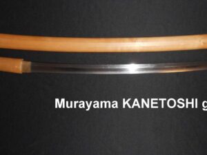 Close-up of a blade with the inscription 'Murayama KANETOS'.