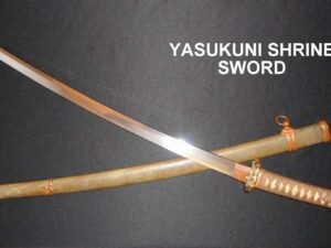 A Yasukuni Shrine sword with wooden sheath on a dark surface.