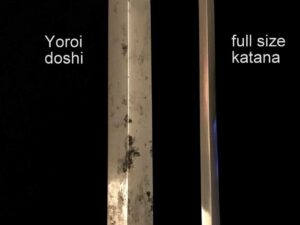 Comparison of a Yoroi doshi and a full-size katana blade edge.